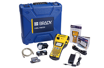 A M410 printer, case, cable, battery, power cord, utility hook, magnet and printer cartridge.